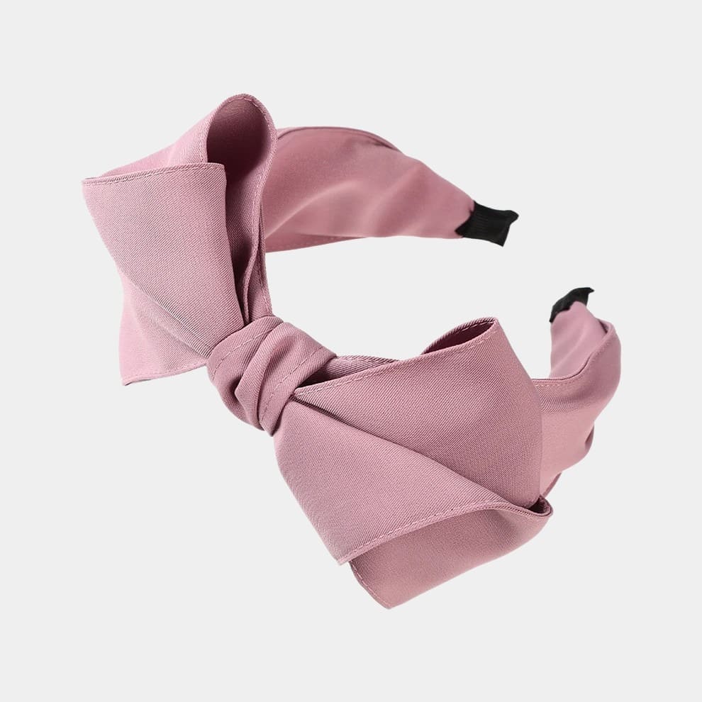 Serre-tête rose avec nœud en tissu