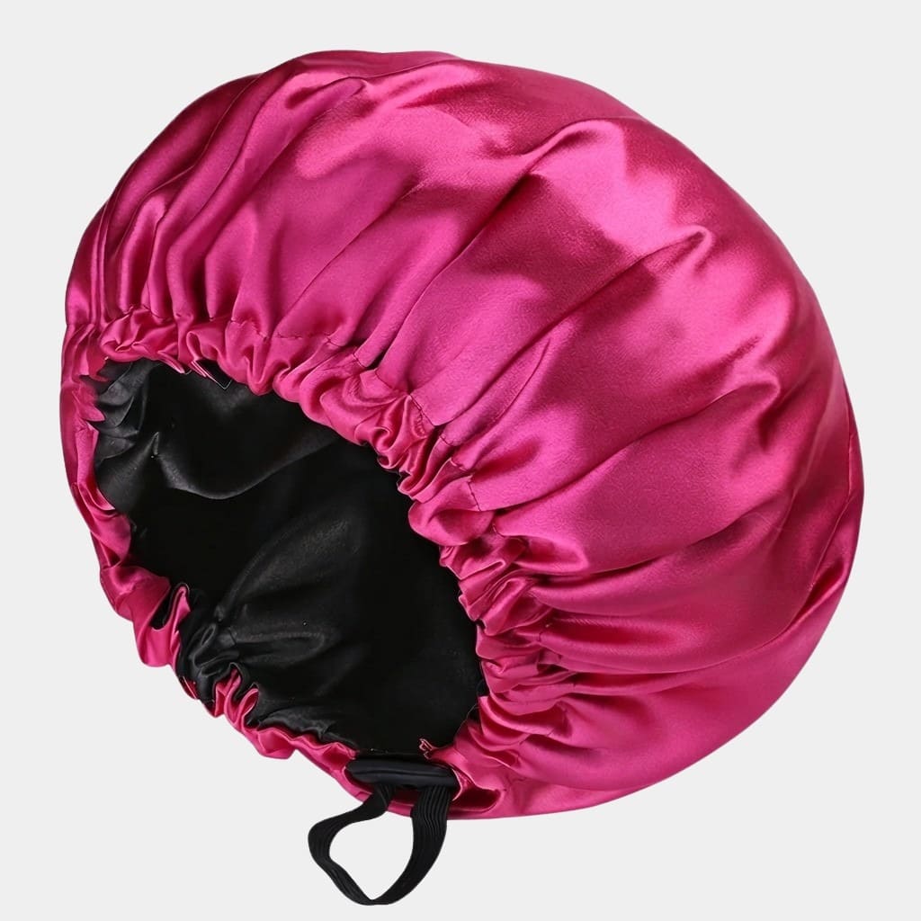 Bonnet doublé en satin rose fuchsia réversible