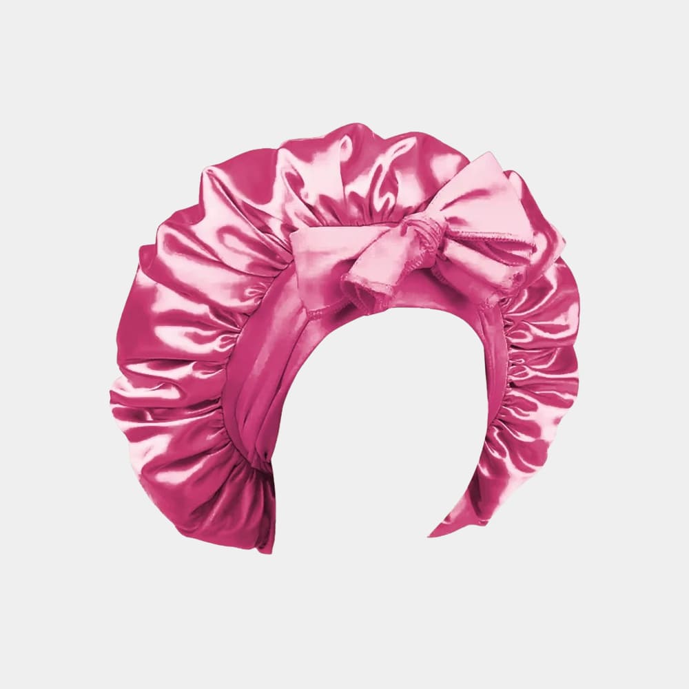 Bonnet de nuit en satin rose fuchsia avec nœud ajustable